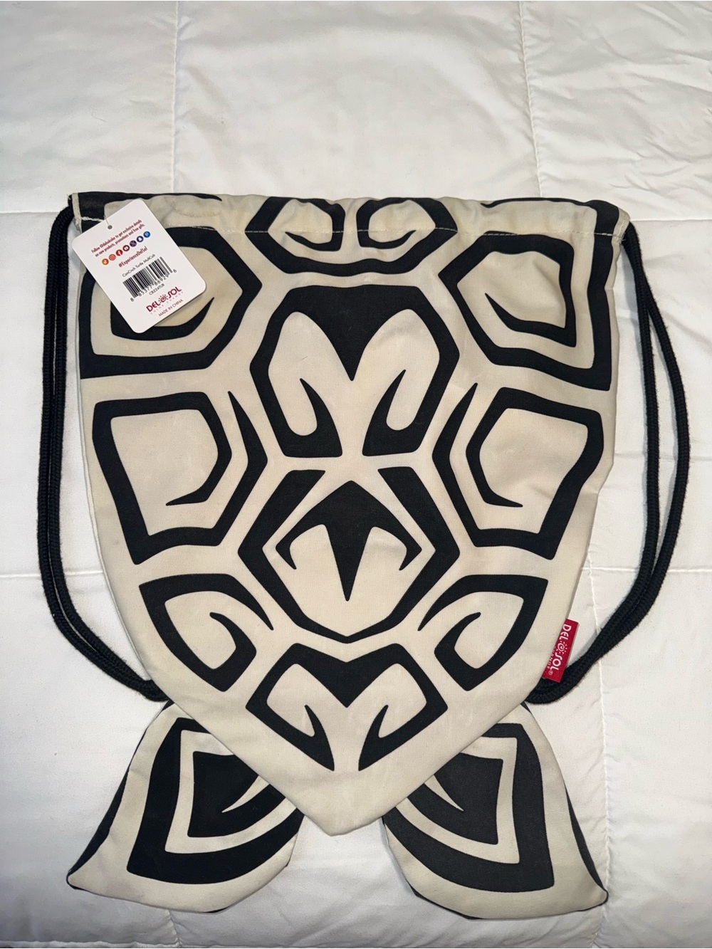 Turtle Graphic color changing Drawstring Backpack in Cream and Black - Picture 6 of 7